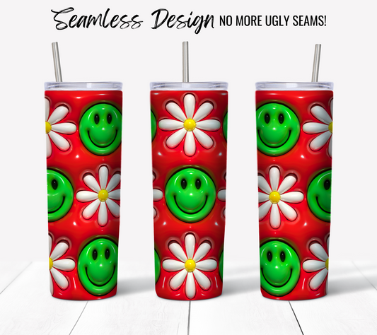 Three 20oz skinny tumblers with the Smiley Face Red 3D Puff design: a seamless red wrap featuring green smiley faces and white daisies, shown upright with metal straws on a white wooden surface. "Seamless Design – NO MORE UGLY SEAMS!" displayed above.