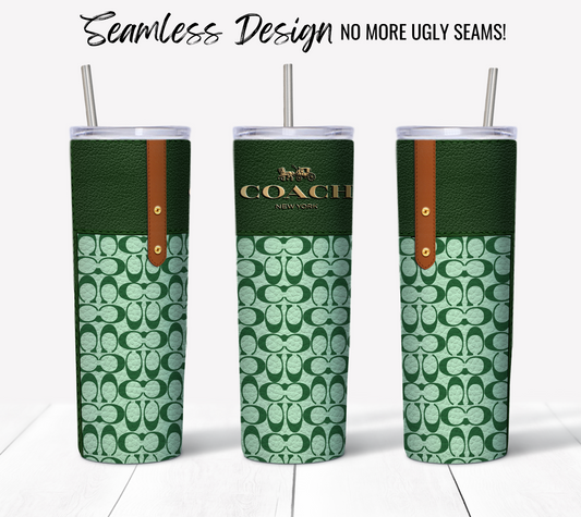 Three NY Coach Forrest Green Monogram tumblers with a leather-like texture feature a repeated pattern of letters, making them ideal for 20 oz Sublimation Tumbler Wrap projects. Each includes a metal straw and showcases a seamless sublimation printing design. The scene is set against a simple white surface and wall.