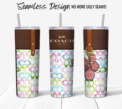 Displayed on a white background are three NY Coach tumblers featuring vibrant designs with brown leather accents. Two 20 oz skinny tumblers flaunt pink and green sunglasses, whereas the third displays charming pink floral motifs. Above them, the text states, "Seamless Design No More Ugly Seams!" making these ideal for sublimation tumbler wraps.