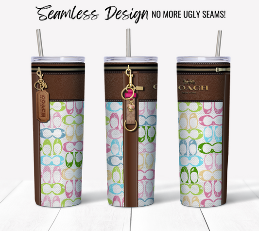 Displayed are three tall, seamless 20 oz skinny tumblers featuring the NY Coach Pastel Monogram Fabric Texture with colorful flip-flop patterns and brown leather accents. Each tumbler includes a metal straw, decorative charms, and displays a logo. The text at the top reads, "Seamless Design No More Ugly Seams!" making it ideal for those in search of unique sublimation tumbler wraps.